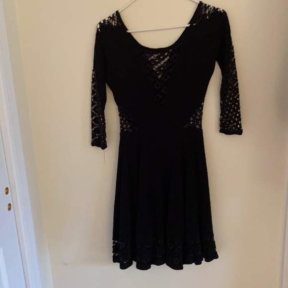Dress with cut outs - Picture 1 of 4